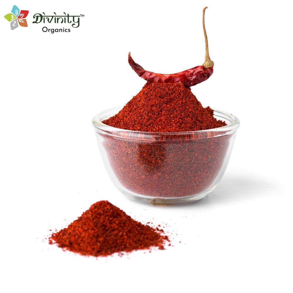 Divinity Organics - Organic Red Chilli Powder -Made from pulverized chillis, chilli powder adds an exquisite flavour to dishes. There are different types of chilli powders available in the market. They can range from too hot to mild, depending upon the way they are made and the kind of chilli used to make the powder. It is known to have exceptional health benefits. From maintaining healthy blood pressure to keeping your eyes healthy, chilli powder should definitely be a part of your everyday diet.